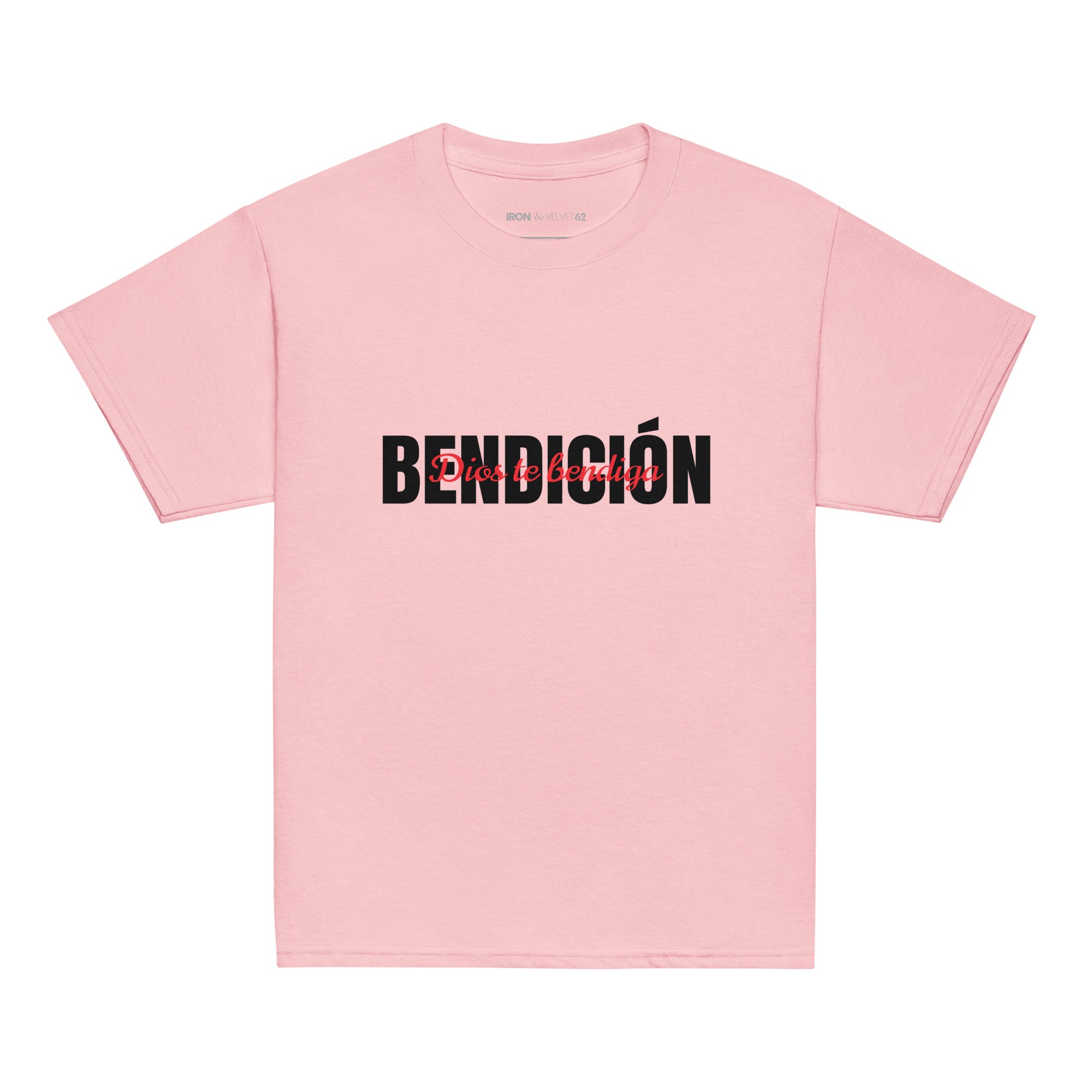 pink bendicion kids tshirt displayed on a white background with bold black bendición text across the chest and smaller red script layered over the center of the design designed by iron and velvet 62