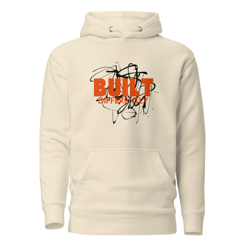 mens built differently bone color hoodie displayed on a white background with bold orange built differently text and abstract graphic design across the chest modern statement streetwear piece by iron and velvet 62