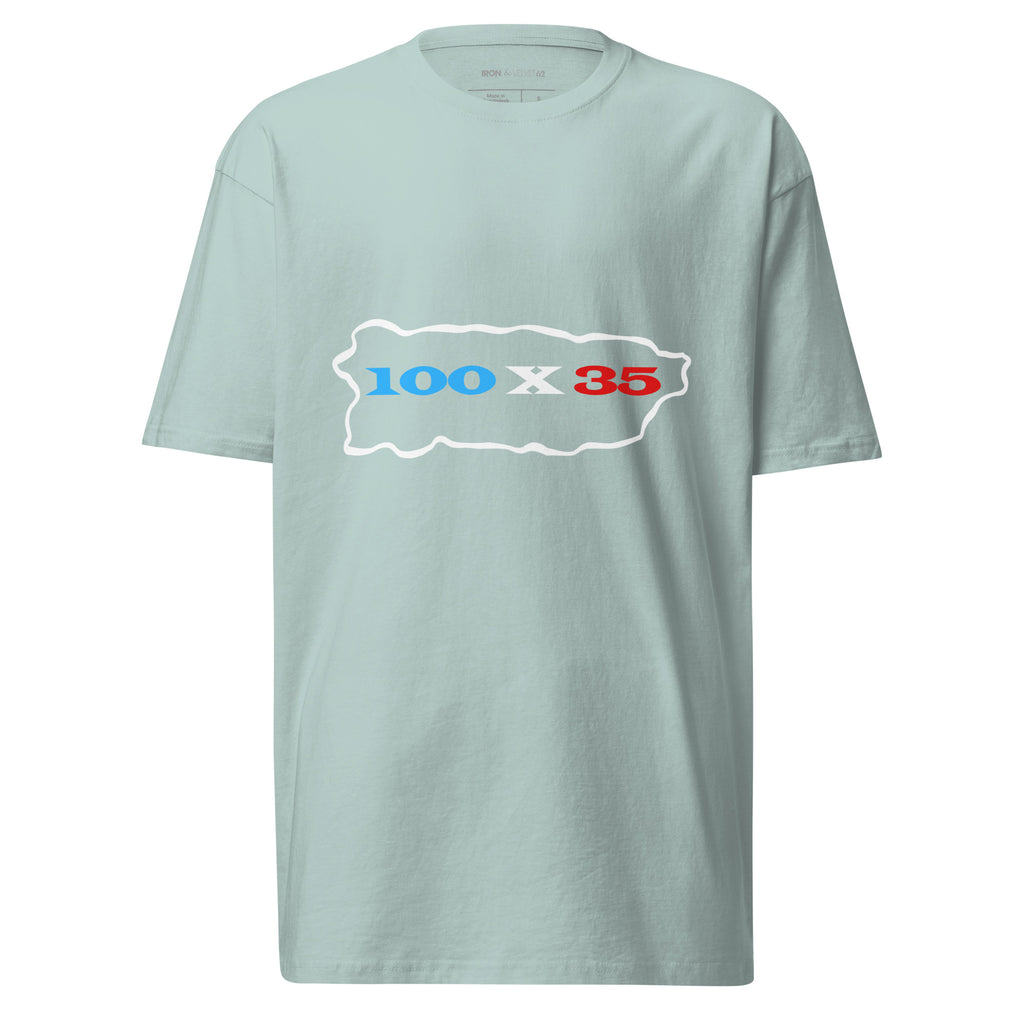 agave color mens tshirt displayed on a white background featuring 100 by 35 text in red white and blue inside a puerto rico island outline minimal boricua statement design by iron and velvet 62