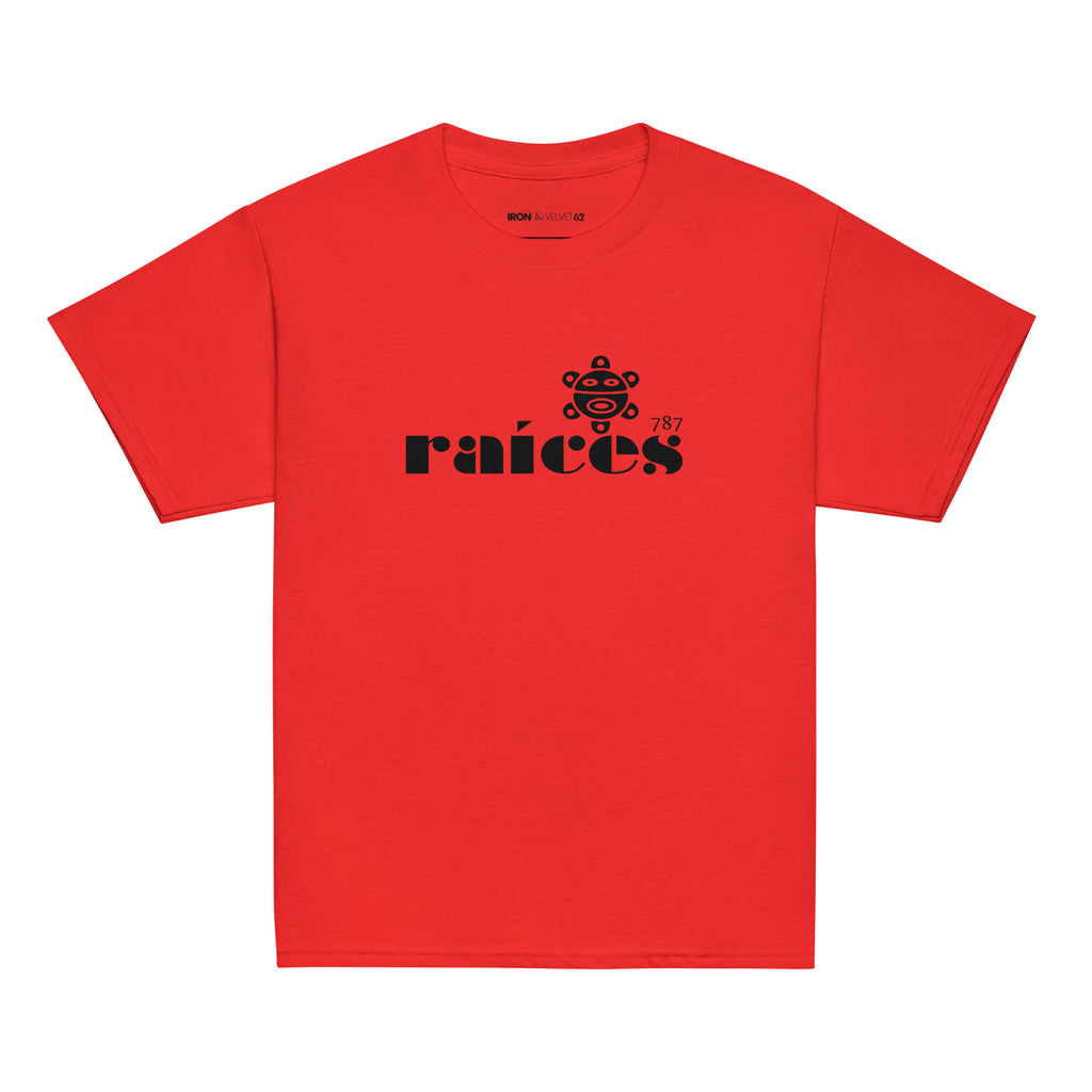 red raices kids tshirt displayed on a white background with bold black raíces text across the chest  taíno sun and 787 detail, puerto rican cultural design by iron and velvet 62