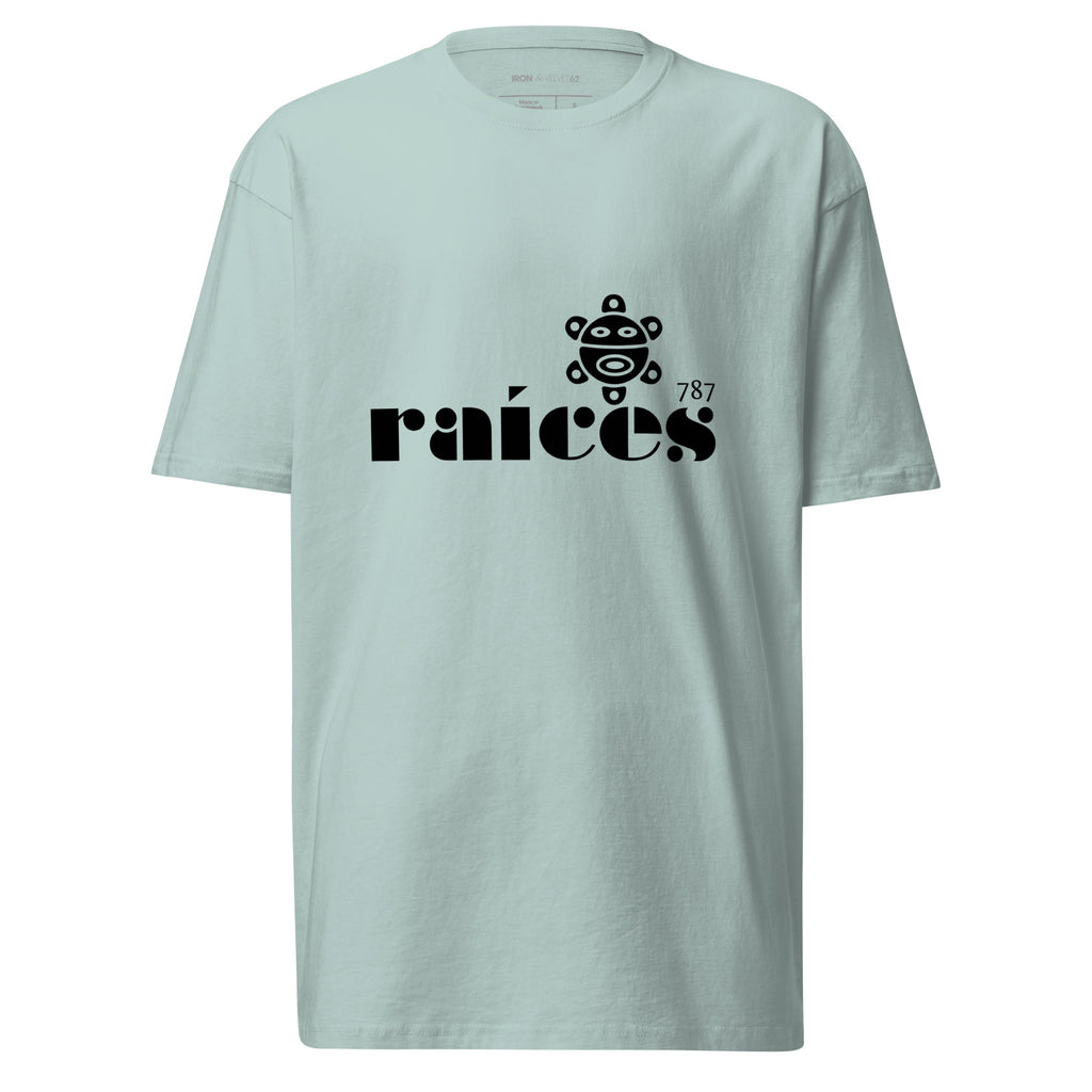 blue men's raices tshirt displayed on a white background with bold black raíces text across the chest and taíno, 787 sun detail, puerto rican cultural design by iron and velvet 62